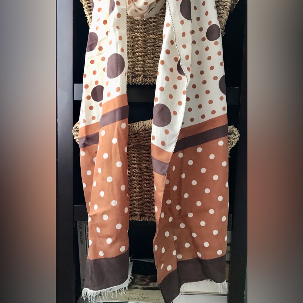 100% SILK polka dot scarf featuring brown and cream colors. 60” x 11”. EUC